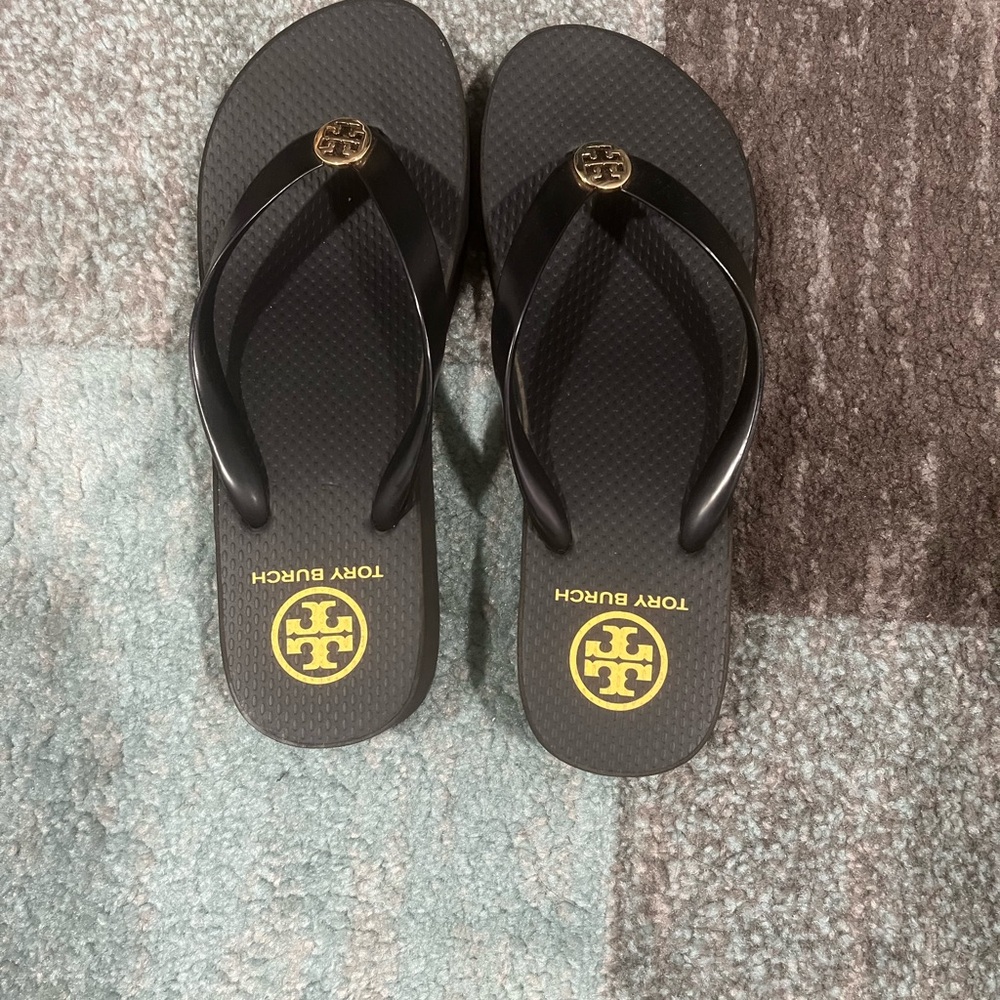 Tory Burch Black Flip Flops with Gold Logo
